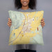 Person holding 18x18 Custom Dillon Montana Map Throw Pillow in Woodblock