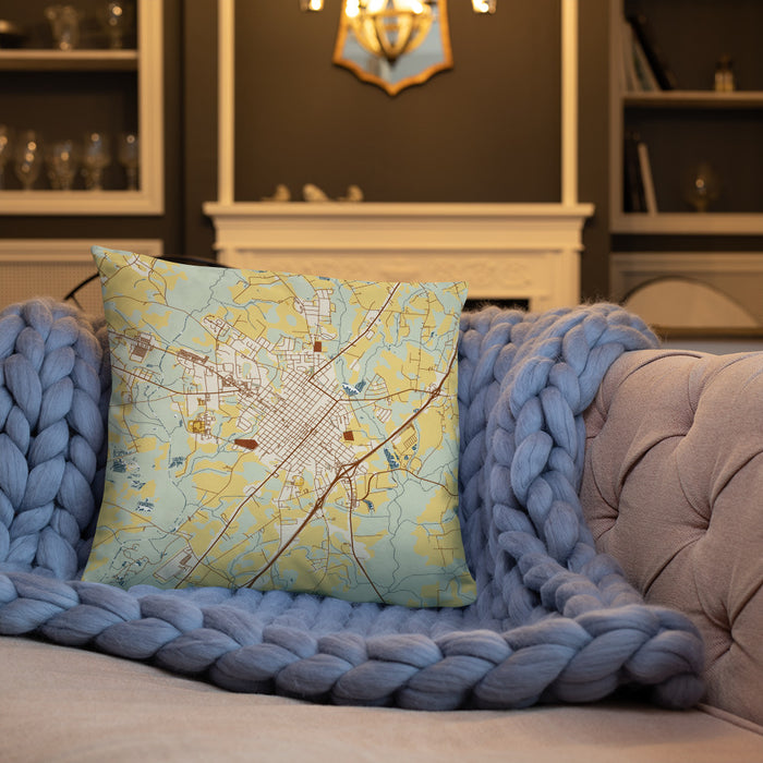 Custom Dunn North Carolina Map Throw Pillow in Woodblock on Cream Colored Couch