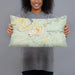 Person holding 20x12 Custom Eatonville Washington Map Throw Pillow in Woodblock