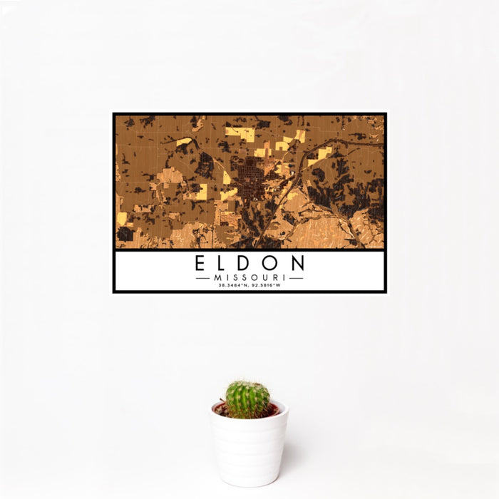 12x18 Eldon Missouri Map Print Landscape Orientation in Ember Style With Small Cactus Plant in White Planter