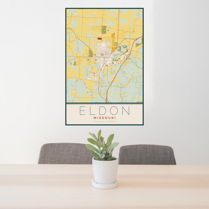 24x36 Eldon Missouri Map Print Portrait Orientation in Woodblock Style Behind 2 Chairs Table and Potted Plant