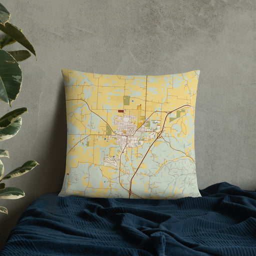 Custom Eldon Missouri Map Throw Pillow in Woodblock on Bedding Against Wall