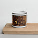 Front View Custom Elk River Minnesota Map Enamel Mug in Ember on Cutting Board