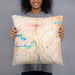 Person holding 18x18 Custom Elk River Minnesota Map Throw Pillow in Watercolor