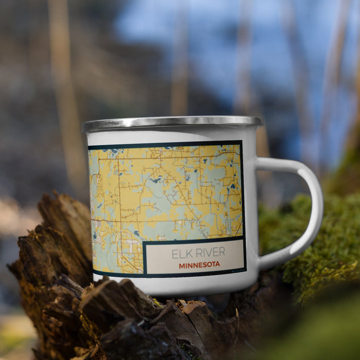 Right View Custom Elk River Minnesota Map Enamel Mug in Woodblock on Grass With Trees in Background