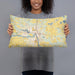 Person holding 20x12 Custom Elk River Minnesota Map Throw Pillow in Woodblock