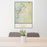 24x36 Ely Nevada Map Print Portrait Orientation in Woodblock Style Behind 2 Chairs Table and Potted Plant