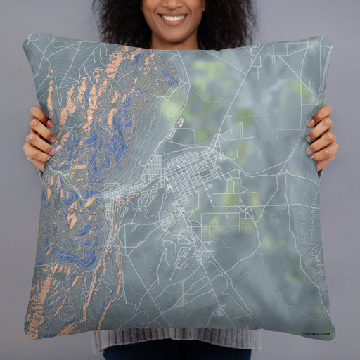 Person holding 22x22 Custom Ely Nevada Map Throw Pillow in Afternoon