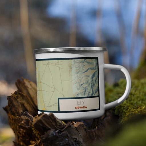 Right View Custom Ely Nevada Map Enamel Mug in Woodblock on Grass With Trees in Background