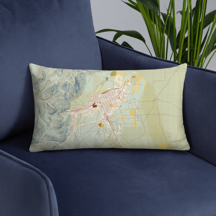 Custom Ely Nevada Map Throw Pillow in Woodblock on Blue Colored Chair
