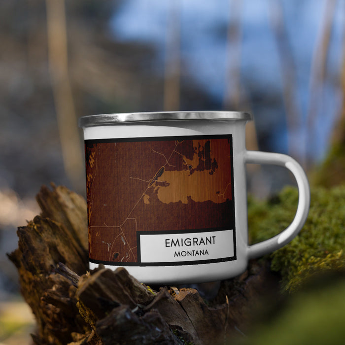 Right View Custom Emigrant Montana Map Enamel Mug in Ember on Grass With Trees in Background