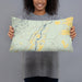 Person holding 20x12 Custom Emigrant Montana Map Throw Pillow in Woodblock