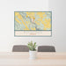 24x36 Estacada Oregon Map Print Lanscape Orientation in Woodblock Style Behind 2 Chairs Table and Potted Plant
