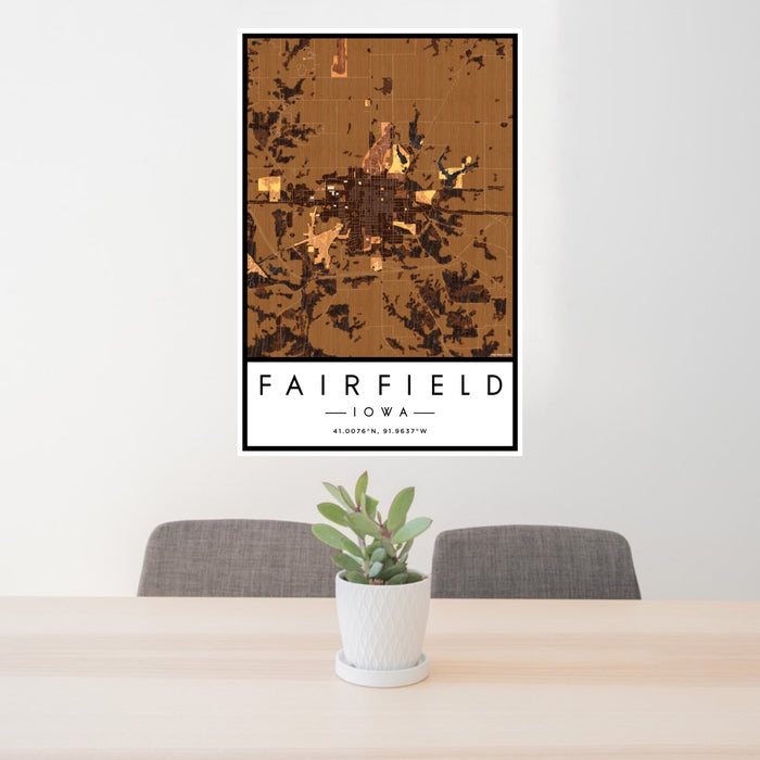 24x36 Fairfield Iowa Map Print Portrait Orientation in Ember Style Behind 2 Chairs Table and Potted Plant