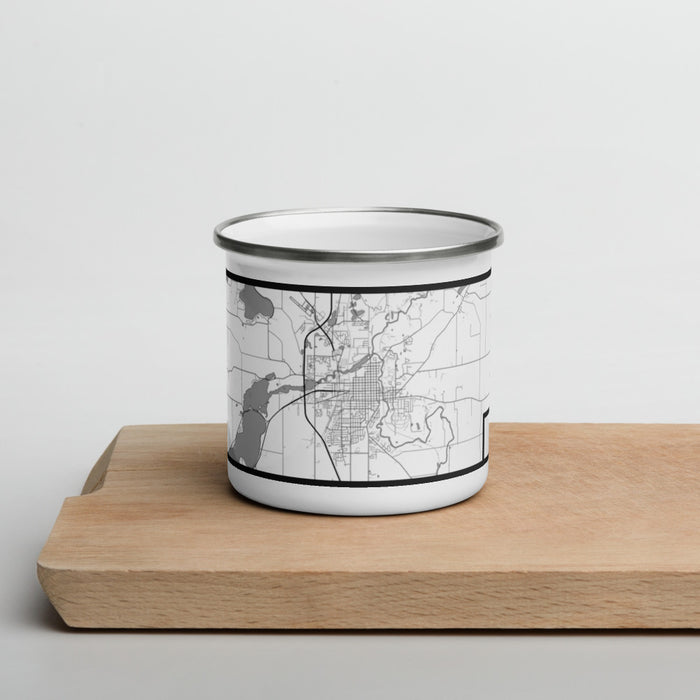 Front View Custom Faribault Minnesota Map Enamel Mug in Classic on Cutting Board