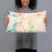 Person holding 20x12 Custom Faribault Minnesota Map Throw Pillow in Watercolor