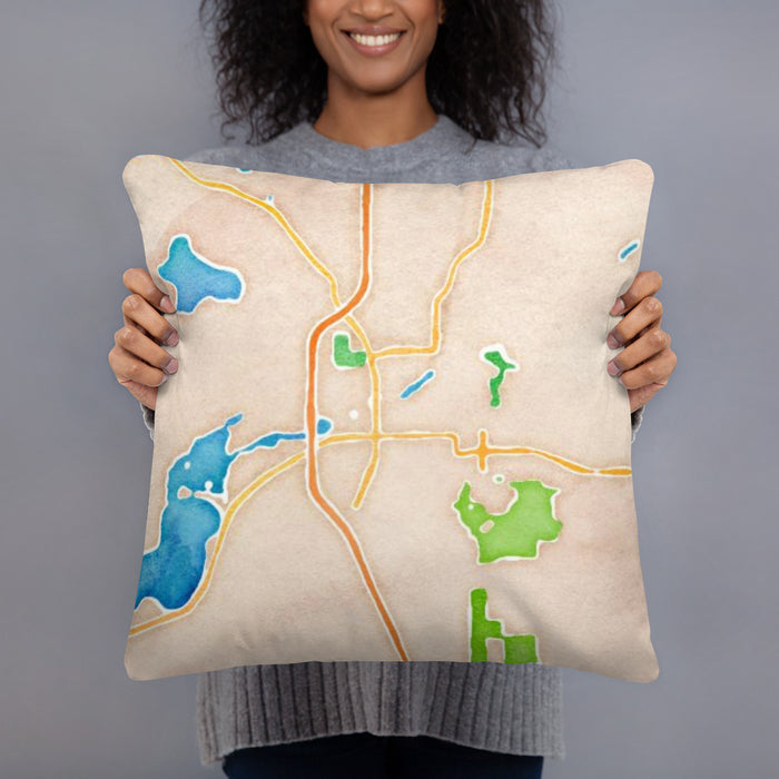 Person holding 18x18 Custom Faribault Minnesota Map Throw Pillow in Watercolor
