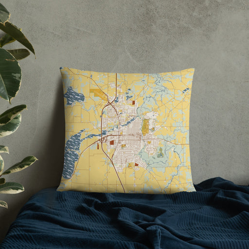 Custom Faribault Minnesota Map Throw Pillow in Woodblock on Bedding Against Wall