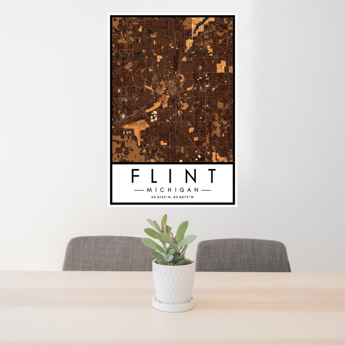 24x36 Flint Michigan Map Print Portrait Orientation in Ember Style Behind 2 Chairs Table and Potted Plant