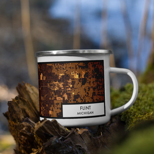 Right View Custom Flint Michigan Map Enamel Mug in Ember on Grass With Trees in Background