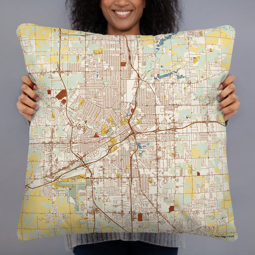 Person holding 22x22 Custom Flint Michigan Map Throw Pillow in Woodblock