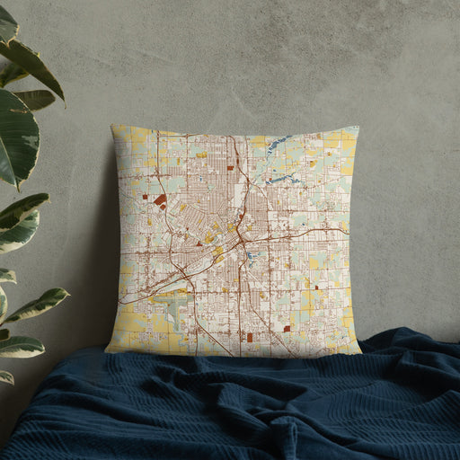 Custom Flint Michigan Map Throw Pillow in Woodblock on Bedding Against Wall