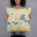 Person holding 18x18 Custom Forest Lake Minnesota Map Throw Pillow in Woodblock