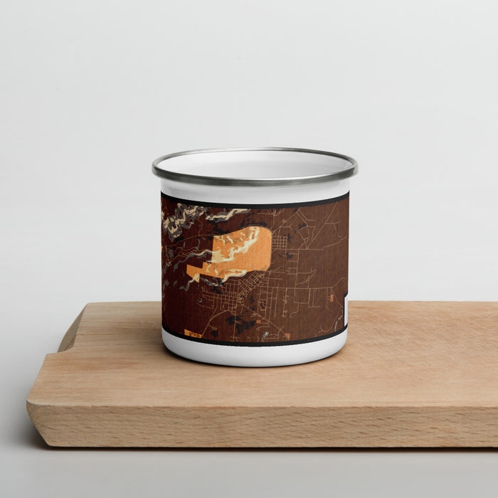 Front View Custom Fort Davis Texas Map Enamel Mug in Ember on Cutting Board