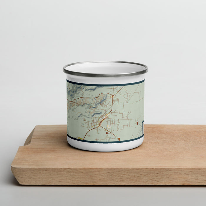 Front View Custom Fort Davis Texas Map Enamel Mug in Woodblock on Cutting Board