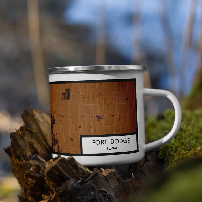 Right View Custom Fort Dodge Iowa Map Enamel Mug in Ember on Grass With Trees in Background