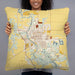 Person holding 22x22 Custom Fort Dodge Iowa Map Throw Pillow in Woodblock