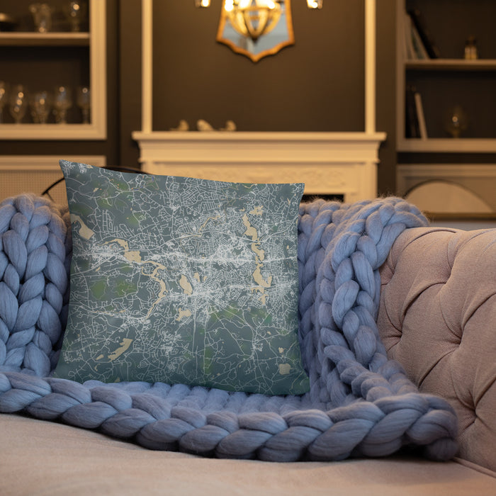 Custom Framingham Massachusetts Map Throw Pillow in Afternoon on Cream Colored Couch