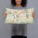 Person holding 20x12 Custom Framingham Massachusetts Map Throw Pillow in Woodblock