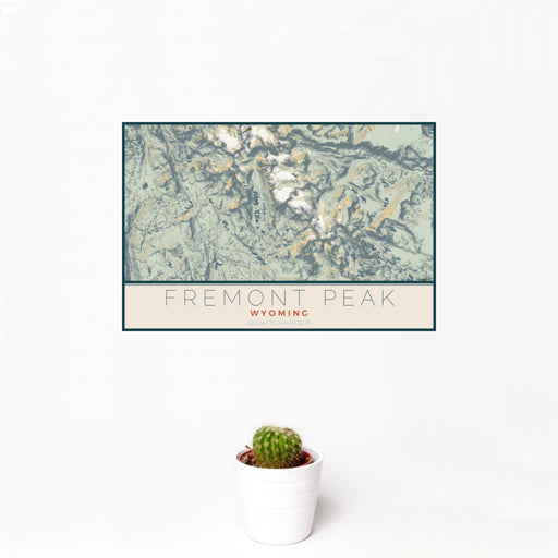 12x18 Fremont Peak Wyoming Map Print Landscape Orientation in Woodblock Style With Small Cactus Plant in White Planter