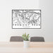 24x36 Fremont Peak Wyoming Map Print Lanscape Orientation in Classic Style Behind 2 Chairs Table and Potted Plant