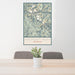 24x36 Fremont Peak Wyoming Map Print Portrait Orientation in Woodblock Style Behind 2 Chairs Table and Potted Plant