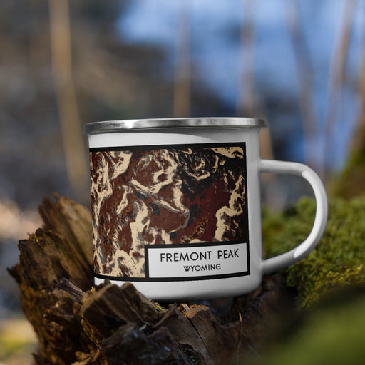 Right View Custom Fremont Peak Wyoming Map Enamel Mug in Ember on Grass With Trees in Background