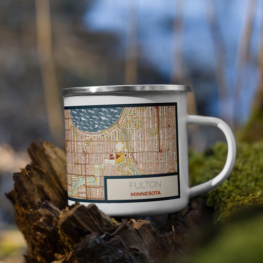 Right View Custom Fulton Minnesota Map Enamel Mug in Woodblock on Grass With Trees in Background