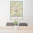 24x36 Gadsden Alabama Map Print Portrait Orientation in Woodblock Style Behind 2 Chairs Table and Potted Plant