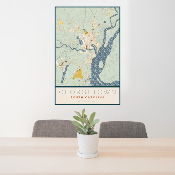 24x36 Georgetown South Carolina Map Print Portrait Orientation in Woodblock Style Behind 2 Chairs Table and Potted Plant