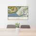 24x36 Girdwood Alaska Map Print Lanscape Orientation in Woodblock Style Behind 2 Chairs Table and Potted Plant