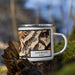 Right View Custom Girdwood Alaska Map Enamel Mug in Ember on Grass With Trees in Background