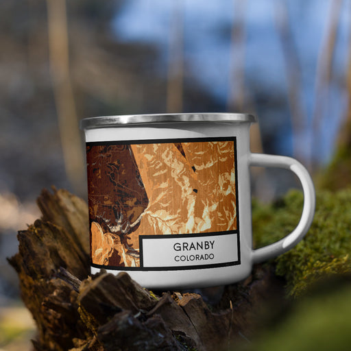 Right View Custom Granby Colorado Map Enamel Mug in Ember on Grass With Trees in Background