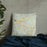 Custom Granby Colorado Map Throw Pillow in Woodblock on Bedding Against Wall
