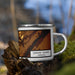 Right View Custom Grand Island Nebraska Map Enamel Mug in Ember on Grass With Trees in Background