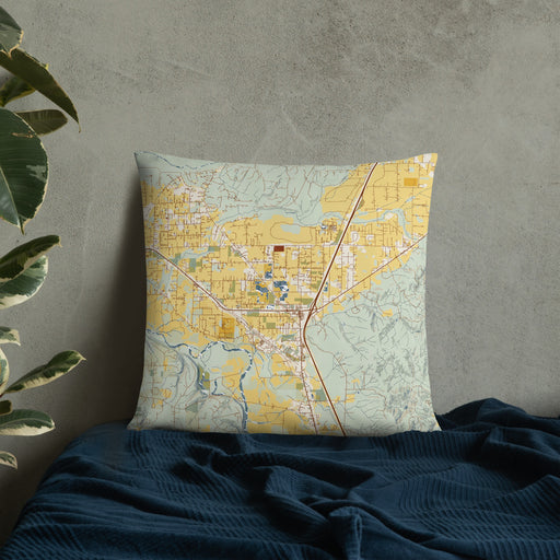 Custom Grand Mound Washington Map Throw Pillow in Woodblock on Bedding Against Wall