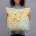 Person holding 18x18 Custom Grand Mound Washington Map Throw Pillow in Woodblock