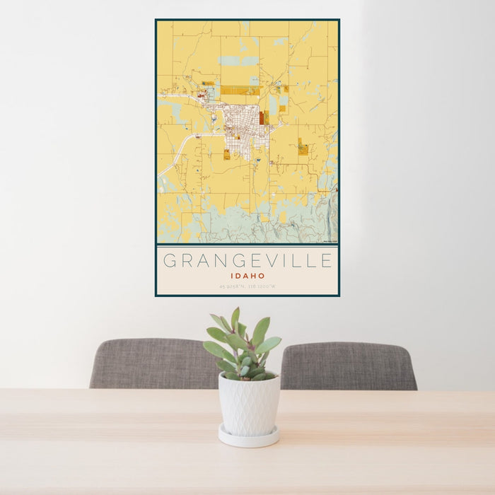 24x36 Grangeville Idaho Map Print Portrait Orientation in Woodblock Style Behind 2 Chairs Table and Potted Plant