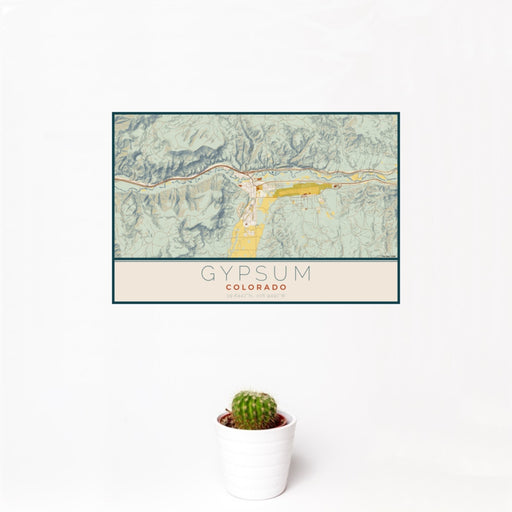 12x18 Gypsum Colorado Map Print Landscape Orientation in Woodblock Style With Small Cactus Plant in White Planter