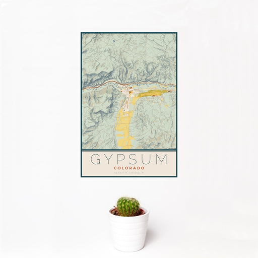 12x18 Gypsum Colorado Map Print Portrait Orientation in Woodblock Style With Small Cactus Plant in White Planter